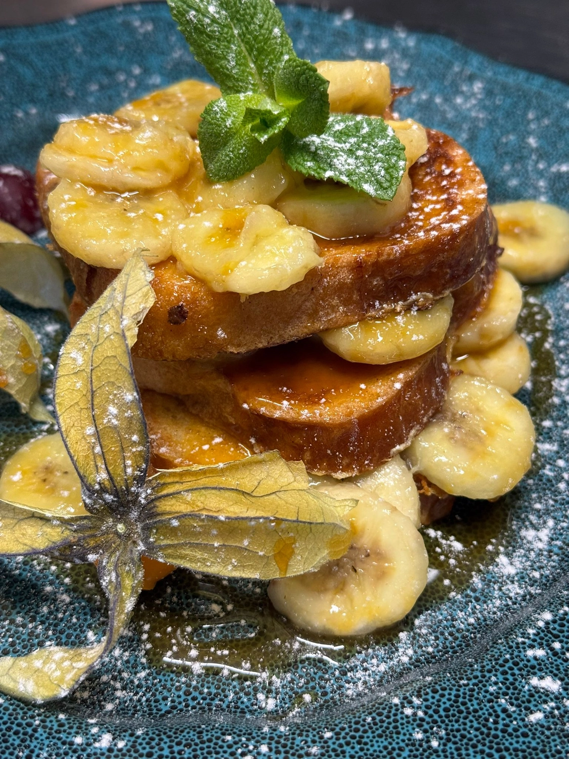 Bistro Maximilian -  Gastronomie - Ein Teller Spaghetti mit einer roten Tomatensoße